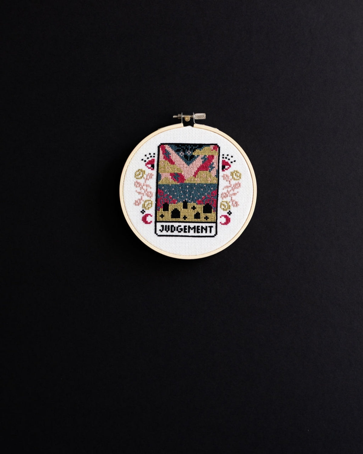 judgement tarot cross stitch design on a black background