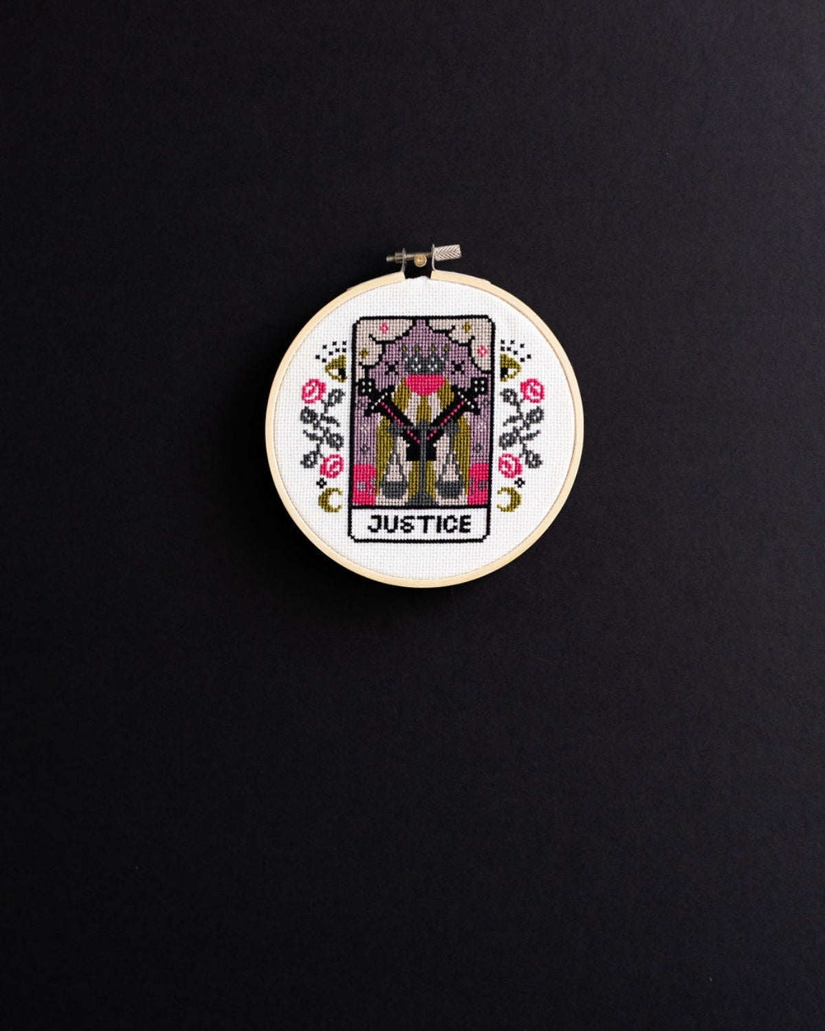 justice tarot cross stitch design on a black background