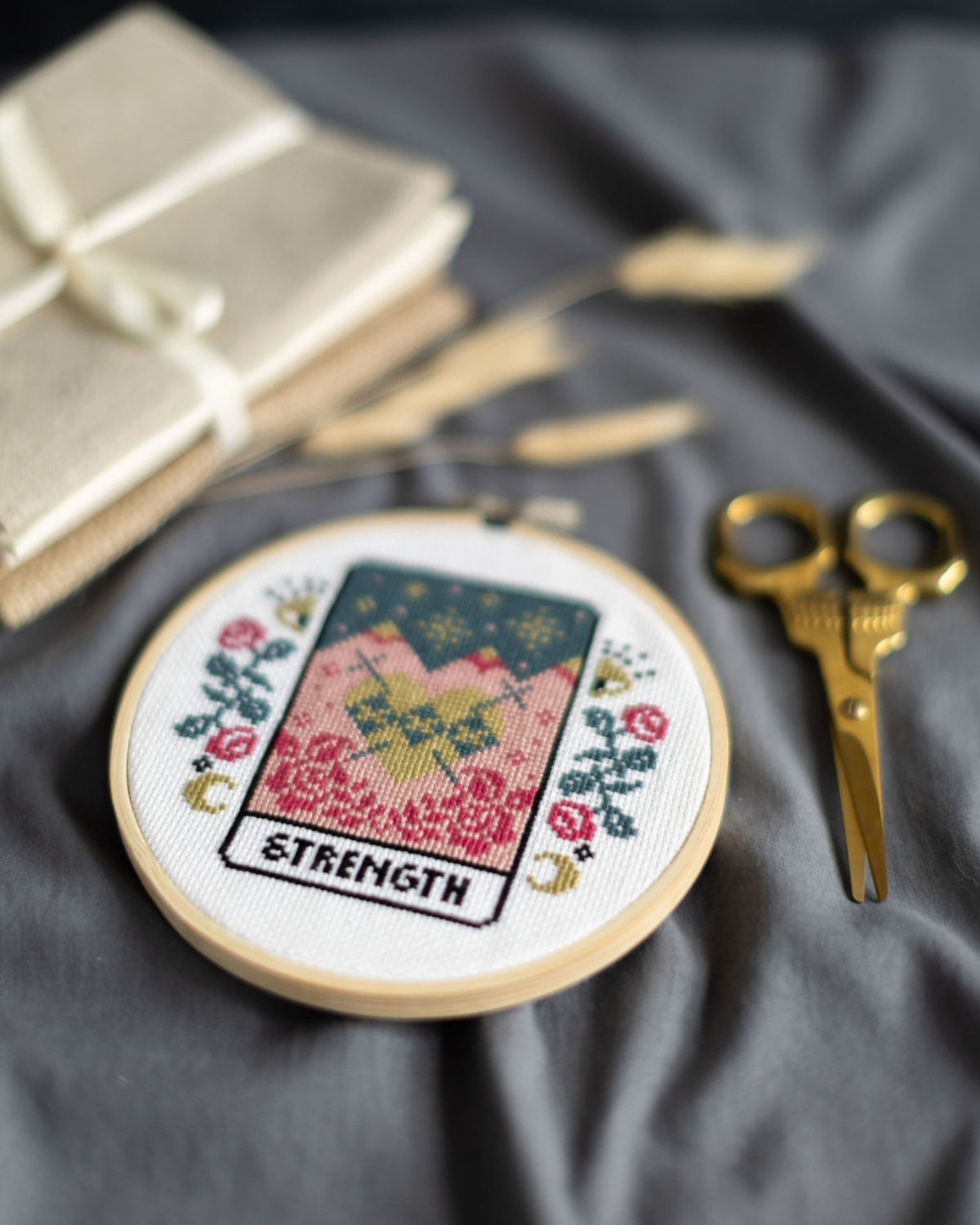 strength tarot cross stitch design close up