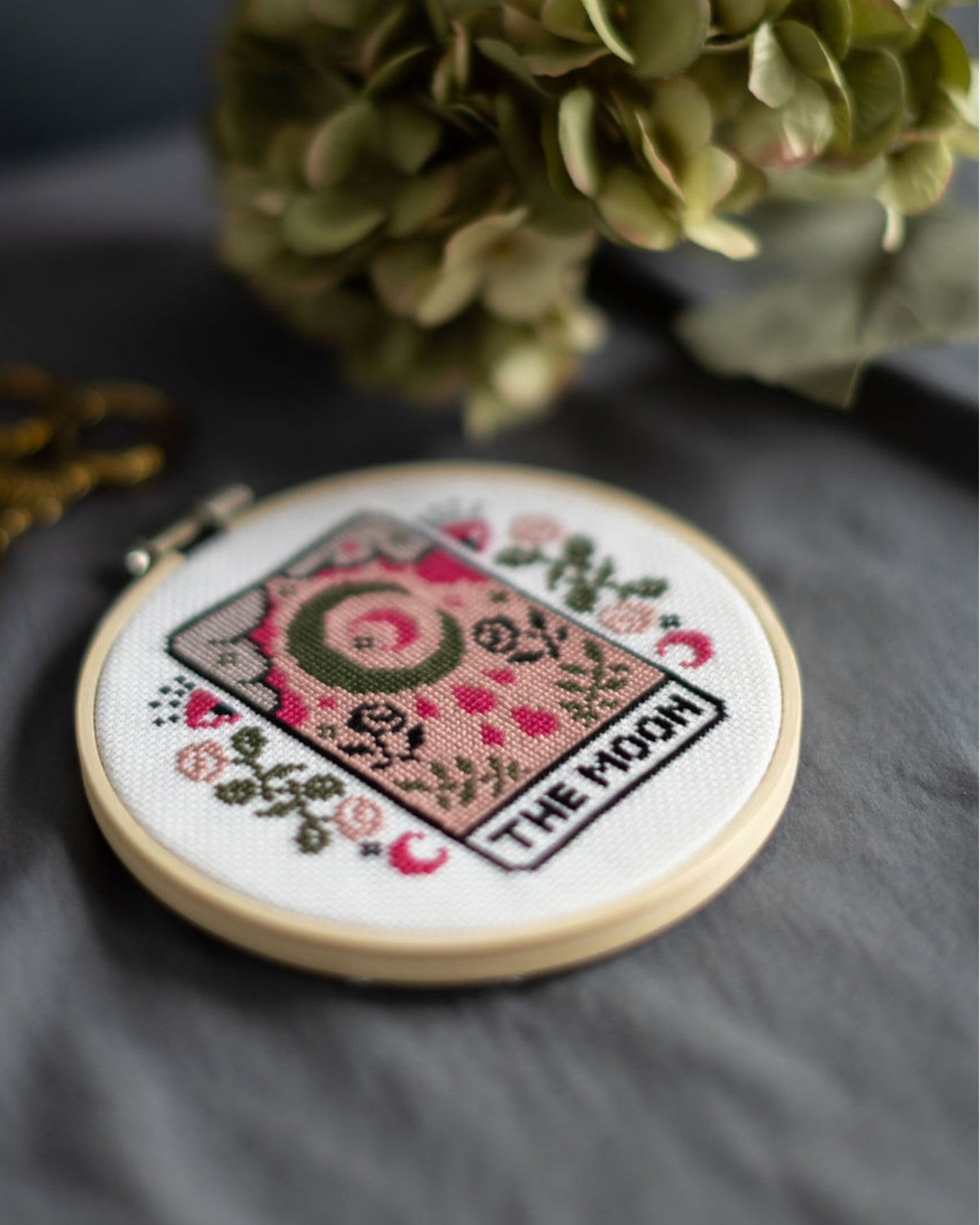 The moon tarot cross stitch design
side on