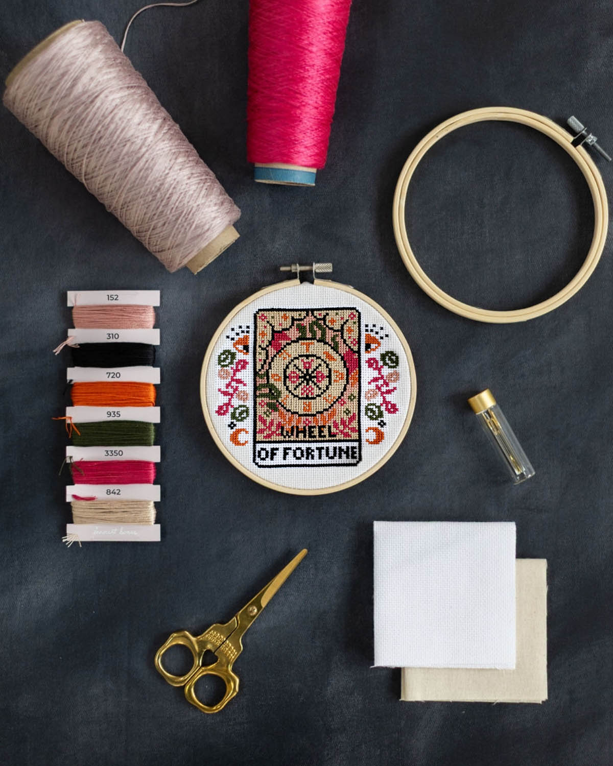 The wheel of fortune tarot cross stitch design with accessories